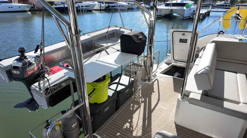 Tut Yacht Photos Pics Leopard 42 Sail 2025 yacht stern with motor and seating area.