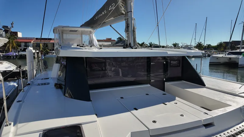 Tut Yacht Photos Pics Leopard 42 Sail 2025 catamaran docked, modern design.