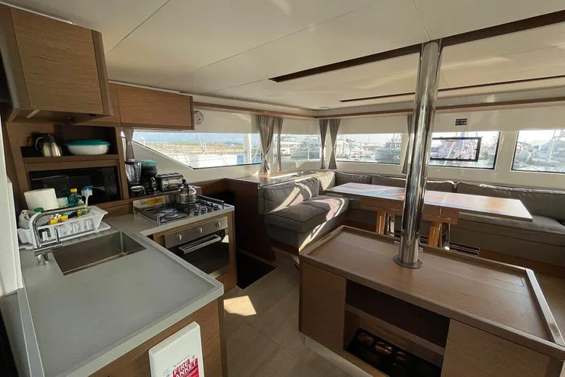 Kowi Kai Yacht Photos Pics Interior of 2020 Lagoon 50 catamaran with modern kitchen and spacious seating area.