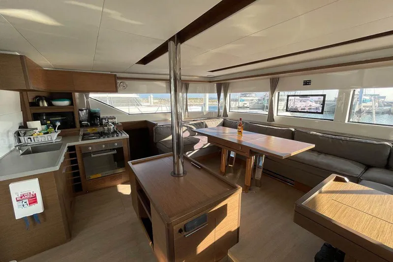 Kowi Kai Yacht Photos Pics Interior of 2020 Lagoon 50 catamaran with modern kitchen and spacious seating area.