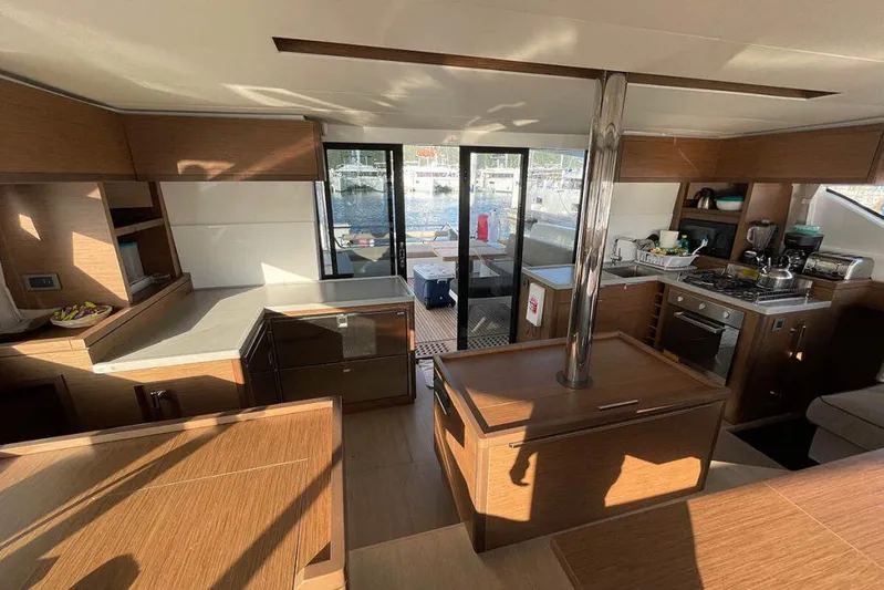 Kowi Kai Yacht Photos Pics Interior of 2020 Lagoon 50 catamaran with modern kitchen and ample natural light.