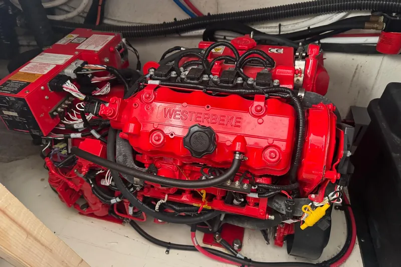  Yacht Photos Pics Red Westerbeke engine in 2022 Regal 38 XO boat, detailed wiring visible.