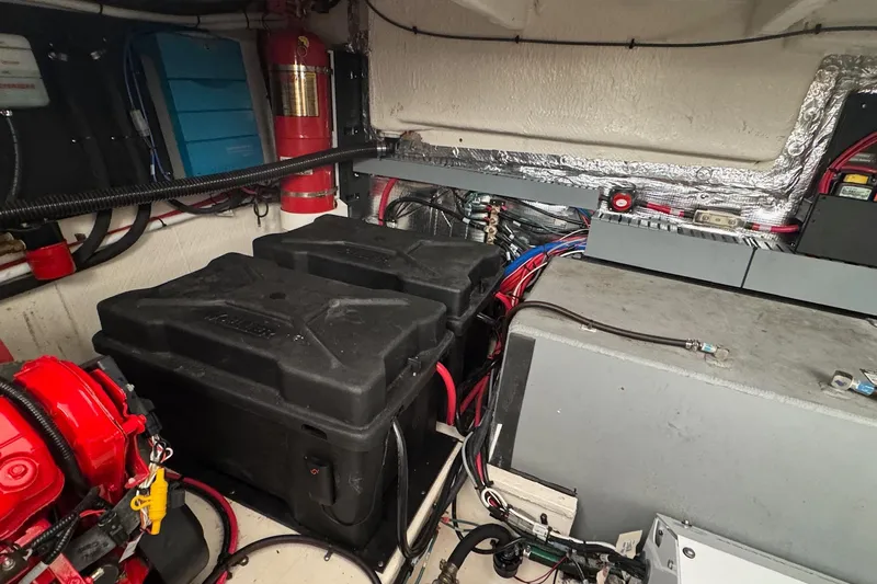  Yacht Photos Pics Engine compartment of 2022 Regal 38 XO boat with batteries and wiring.