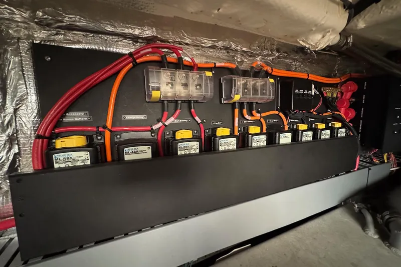  Yacht Photos Pics Electrical panel of a 2022 Regal 38 XO boat with wiring and components.