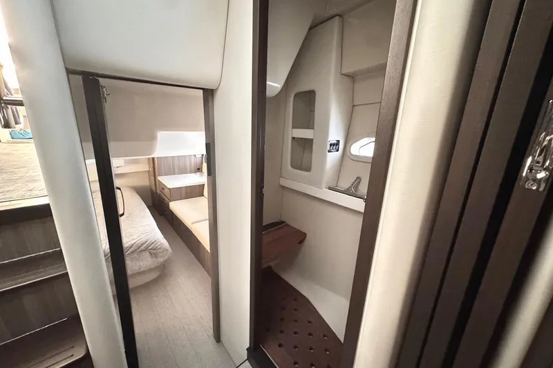  Yacht Photos Pics 2022 Regal 38 XO yacht interior with cozy cabin and modern design.