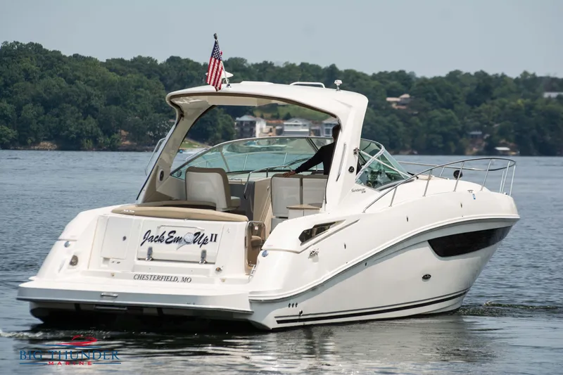  Yacht Photos Pics 2016 Sea Ray 370 Sundancer yacht on a serene lake.