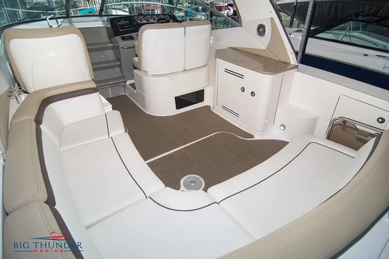  Yacht Photos Pics Luxurious interior of 2016 Sea Ray 370 Sundancer yacht with plush seating.
