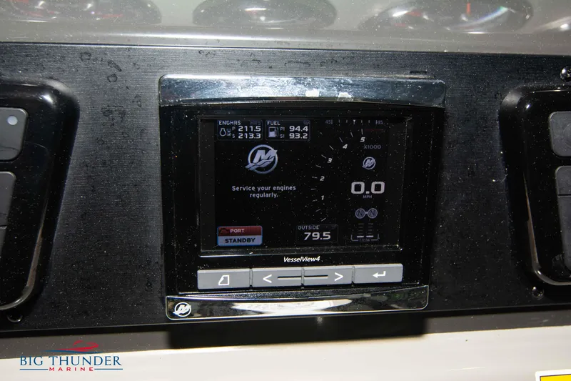  Yacht Photos Pics Dashboard display of a 2016 Sea Ray 370 Sundancer boat, showing engine and fuel data.