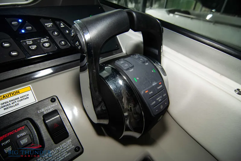  Yacht Photos Pics Close-up of 2016 Sea Ray 370 Sundancer boat throttle controls.