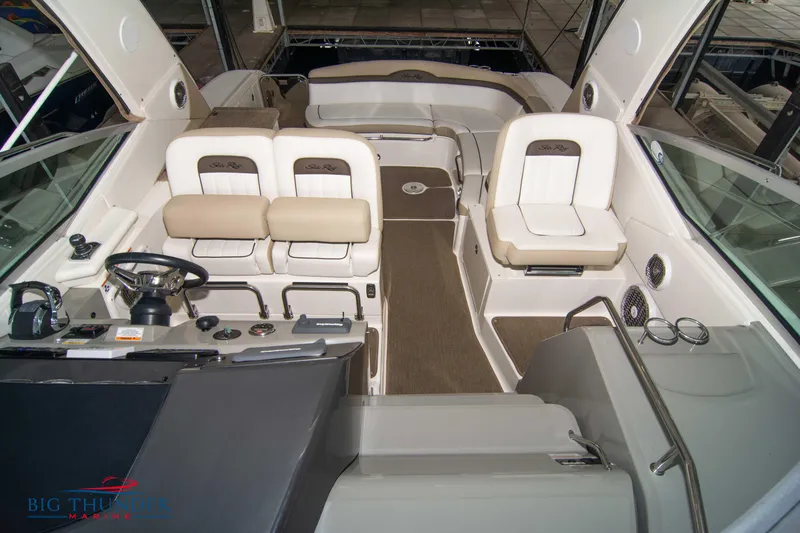  Yacht Photos Pics Interior of 2016 Sea Ray 370 Sundancer boat with white seating and helm.
