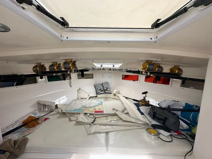  Yacht Photos Pics Interior of a 2016 Strike 35 boat with nautical equipment and maps.