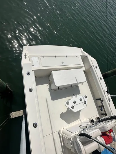  Yacht Photos Pics 2016 Strike 35 boat docked on calm water, featuring a spacious deck layout.