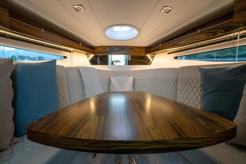 Custom Order Your 28 Scl Today! Yacht Photos Pics 2026 Cobrey Yachts 28 SC Model Interior with Teak Table