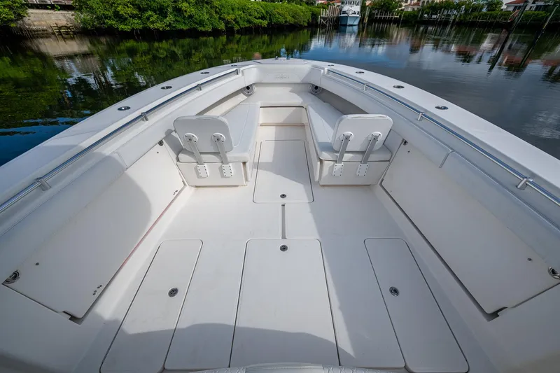  Yacht Photos Pics 2016 Invincible 39 Open Fisherman boat interior with seating and storage compartments.