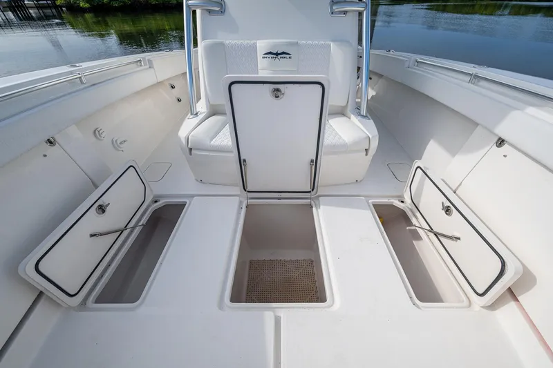  Yacht Photos Pics 2016 Invincible 39 Open Fisherman boat deck with storage compartments open.