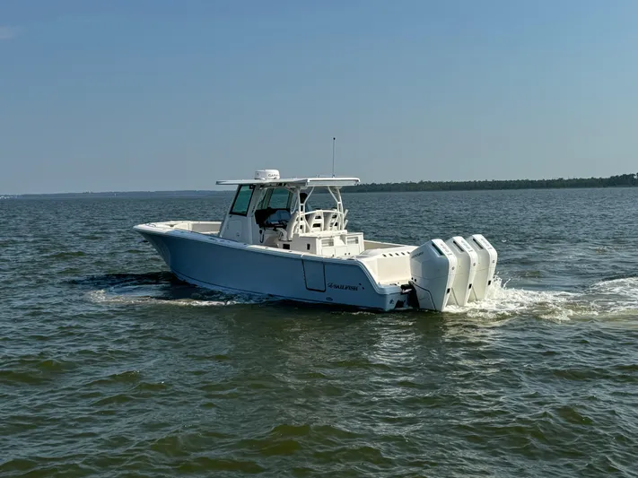  Yacht Photos Pics 2024 Sailfish 360 CC boat cruising on open water.