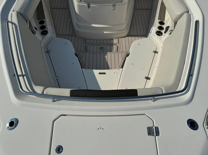  Yacht Photos Pics 2024 Sailfish 360 CC boat interior with seating and cup holders.