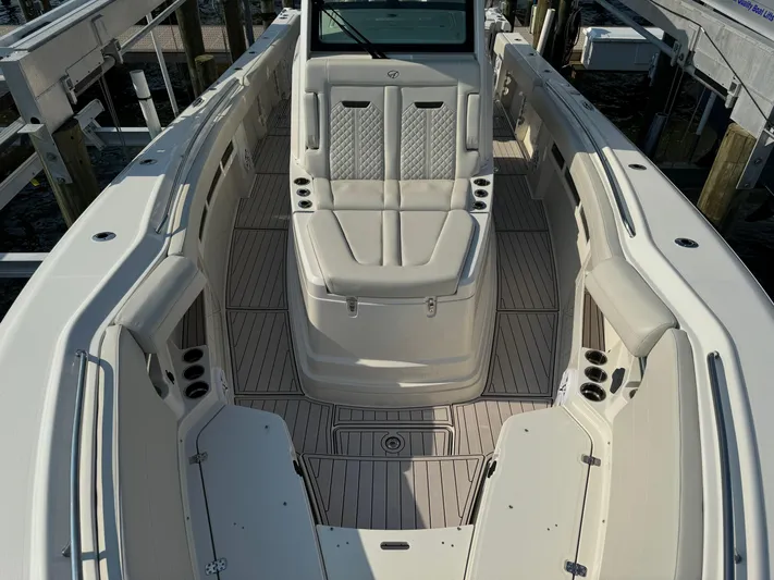  Yacht Photos Pics 2024 Sailfish 360 CC boat interior with spacious seating and modern design.