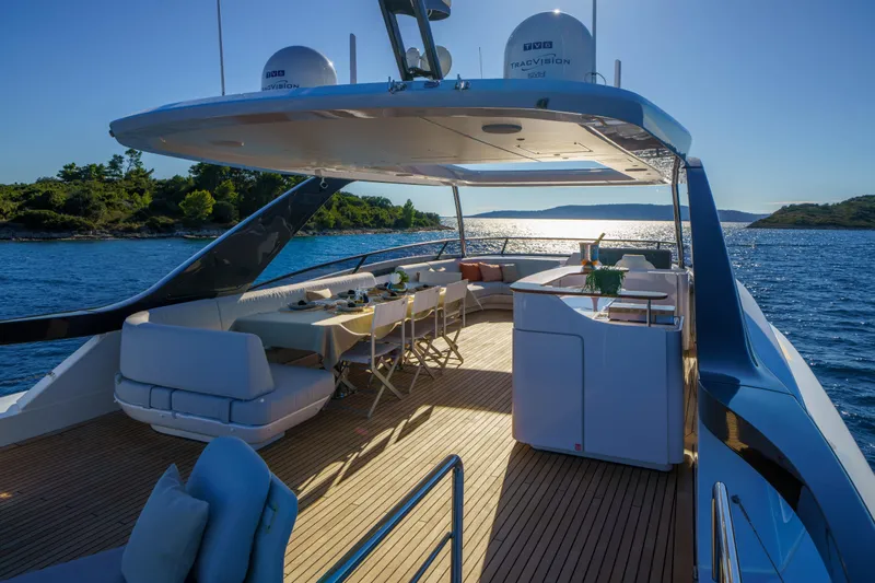  Yacht Photos Pics Luxurious 2025 Azimut Grande 26M yacht deck with elegant seating and ocean view.