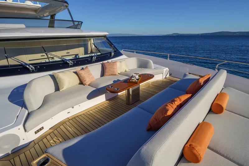  Yacht Photos Pics Luxurious deck seating on 2025 Azimut Grande 26M yacht, overlooking serene ocean view.