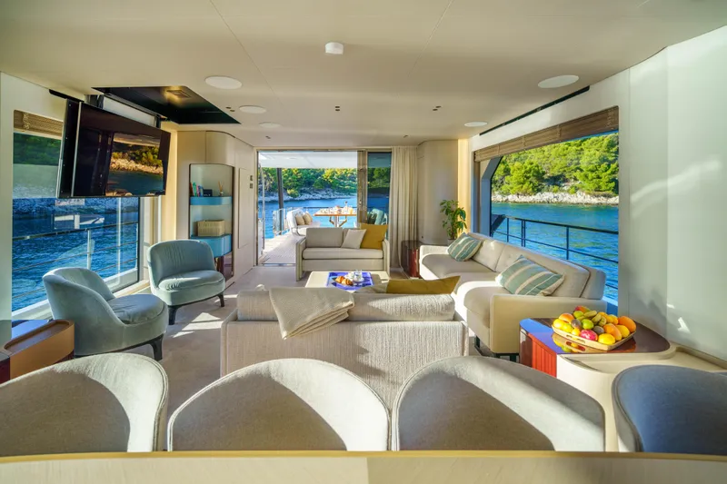  Yacht Photos Pics Luxurious interior of 2025 Azimut Grande 26M yacht with elegant seating and scenic views.