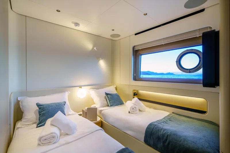  Yacht Photos Pics Luxurious twin cabin on 2025 Azimut Grande 26M yacht with ocean view.