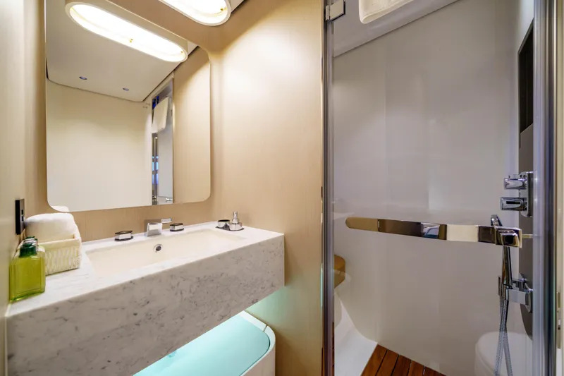  Yacht Photos Pics Luxurious bathroom in 2025 Azimut Grande 26M yacht with modern fixtures and elegant design.
