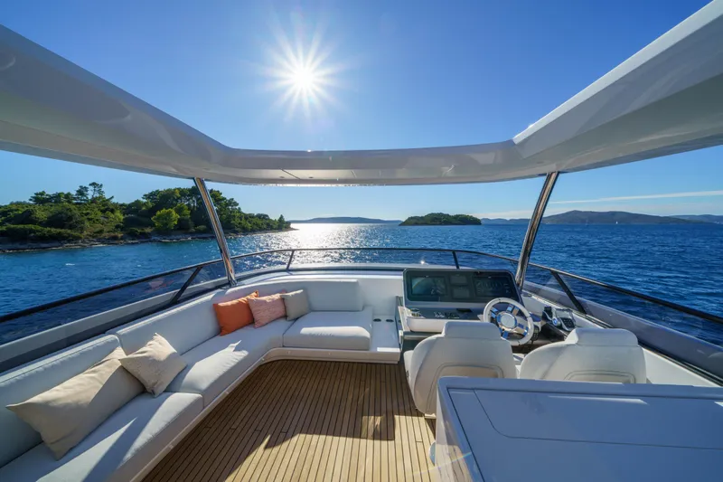  Yacht Photos Pics Luxurious 2025 Azimut Grande 26M yacht interior with ocean view and sunny sky.