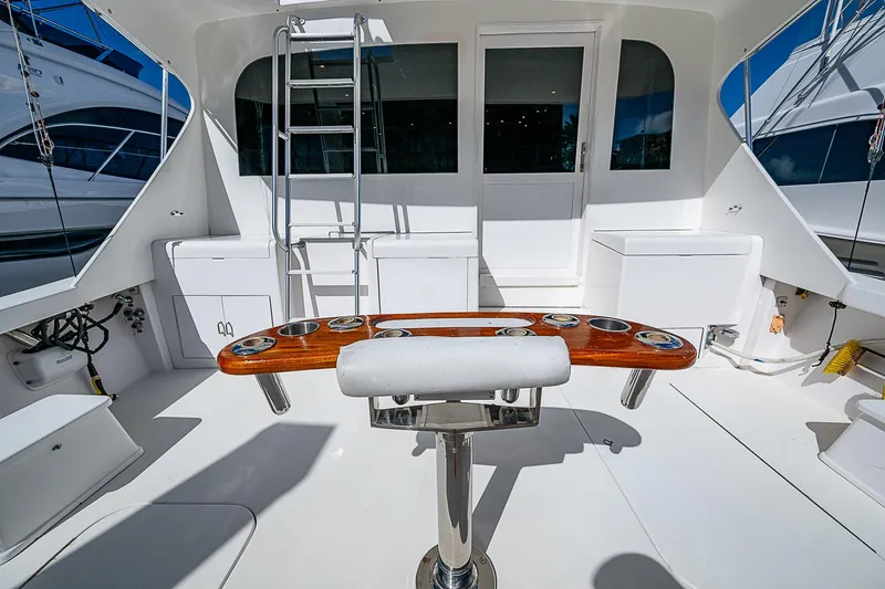 One Of Many Yacht Photos Pics 1999 Post 50 Convertible yacht deck with fishing station and ladder.