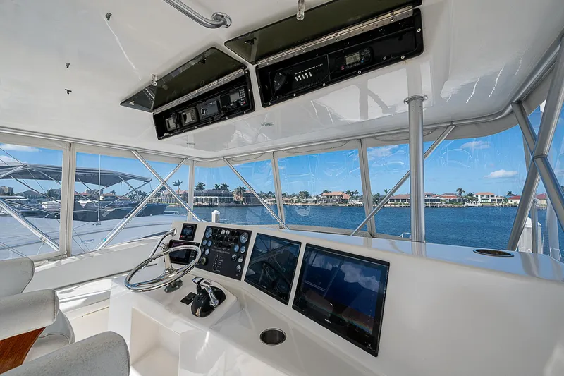 One Of Many Yacht Photos Pics 1999 Post 50 Convertible yacht helm with panoramic water view.