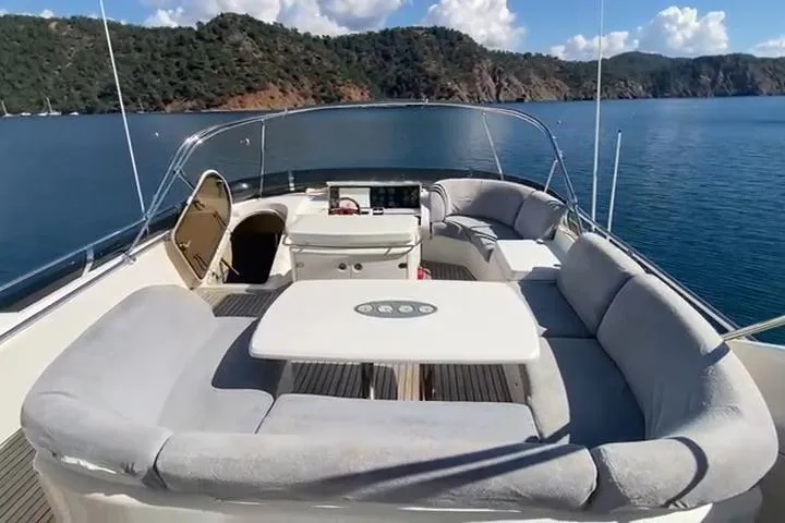  Yacht Photos Pics Luxurious 2007 Princess 21M yacht with spacious deck seating, scenic ocean view.