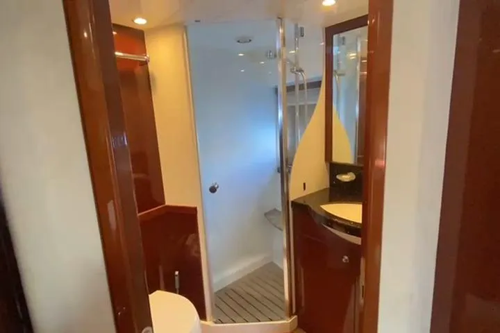  Yacht Photos Pics Luxurious bathroom in 2007 Princess 21M yacht with modern fixtures and elegant design.