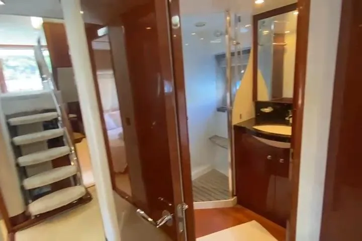  Yacht Photos Pics Luxurious interior of 2007 Princess 21M yacht featuring elegant wood finishes and modern amenities.