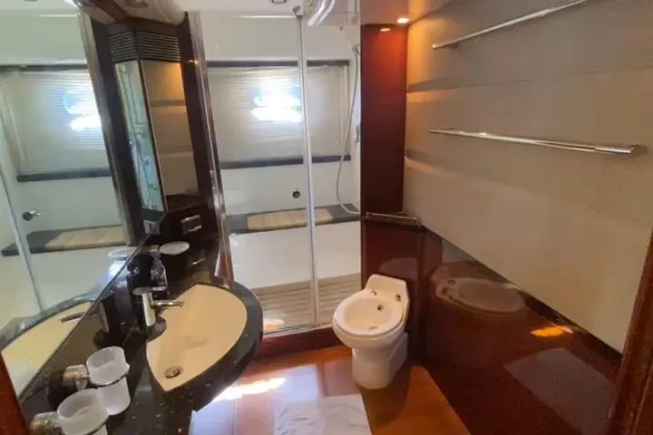  Yacht Photos Pics Luxurious bathroom in 2007 Princess 21M yacht with modern fixtures and elegant design.