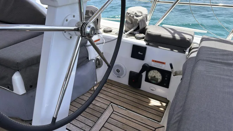 Batesea Yacht Photos Pics Cockpit of 2020 Beneteau Oceanis 46.1 sailboat with steering wheel and navigation instruments.