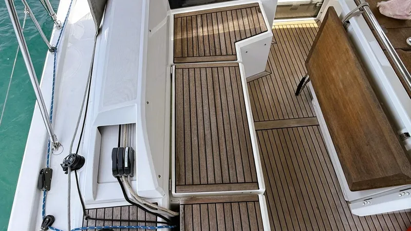 Batesea Yacht Photos Pics Beneteau Oceanis 46.1 2020 yacht deck with teak flooring and seating area.