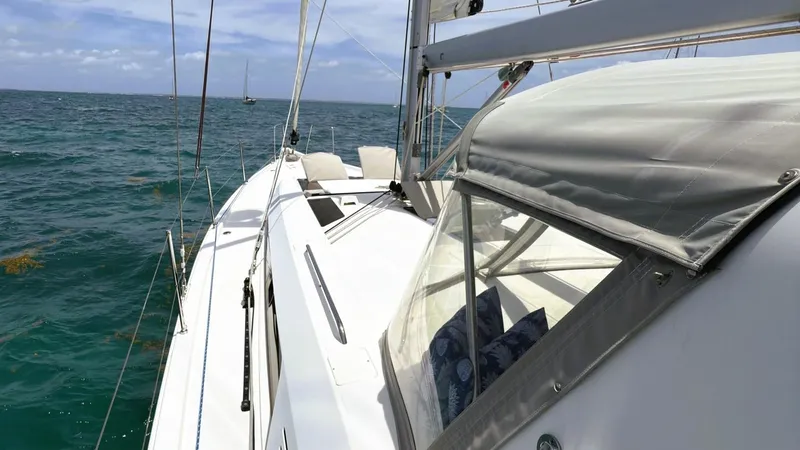Batesea Yacht Photos Pics 2020 Beneteau Oceanis 46.1 sailing on open sea under clear skies.