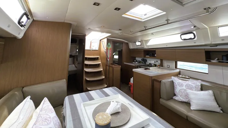 Batesea Yacht Photos Pics Interior of 2020 Beneteau Oceanis 46.1 yacht, featuring modern design and comfortable seating.