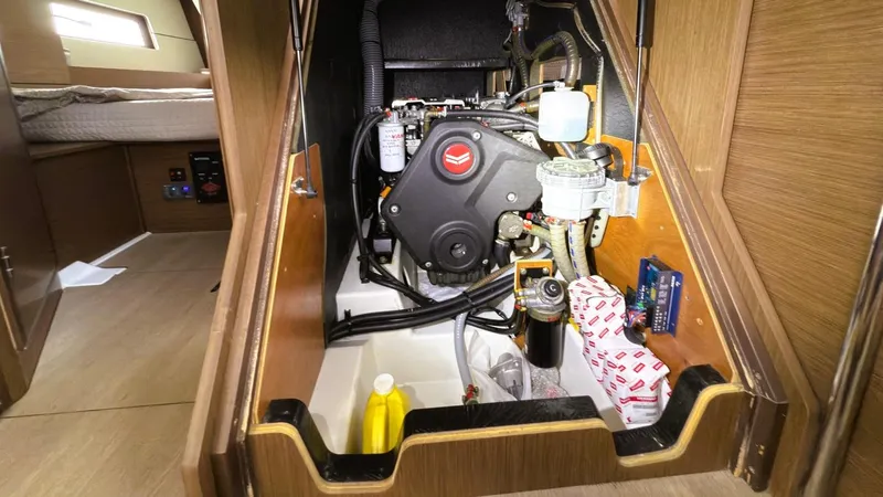 Batesea Yacht Photos Pics Engine compartment of 2020 Beneteau Oceanis 46.1 sailboat, showcasing mechanical components.
