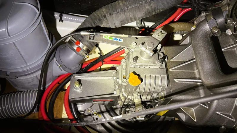 Batesea Yacht Photos Pics Engine compartment of a 2020 Beneteau Oceanis 46.1 sailboat, showing mechanical components and wiring.