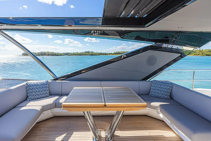 Hideout Yacht Photos Pics Luxurious Sunseeker 88 Yacht 2025 deck with elegant seating and ocean view.