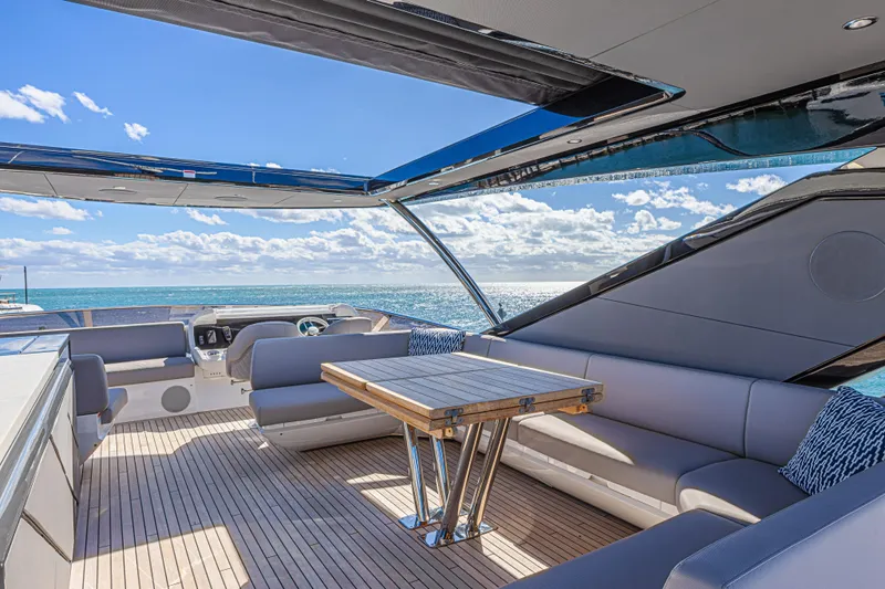 Hideout Yacht Photos Pics Luxurious Sunseeker 88 Yacht 2025 with spacious deck and ocean view.