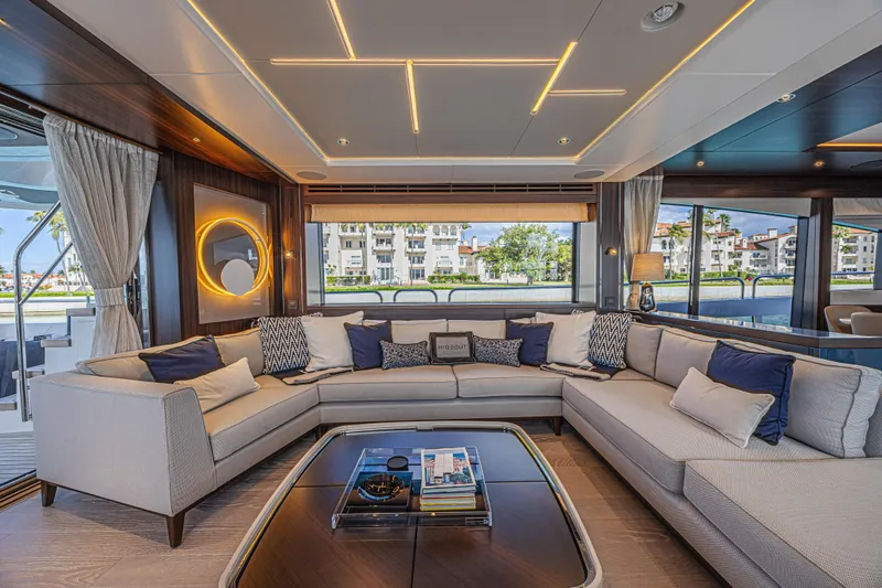 Hideout Yacht Photos Pics Luxurious interior of 2025 Sunseeker 88 Yacht with elegant seating and modern decor.