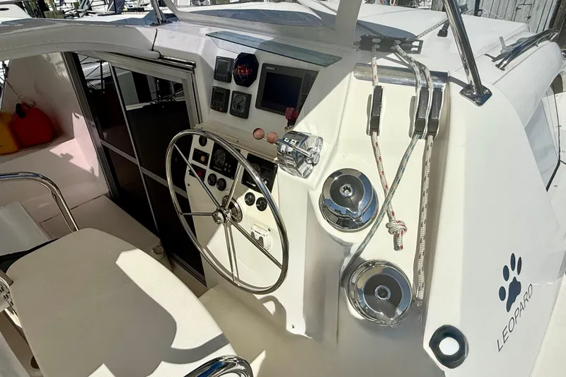  Yacht Photos Pics Helm of 2012 Leopard 39 catamaran with steering wheel and navigation instruments.