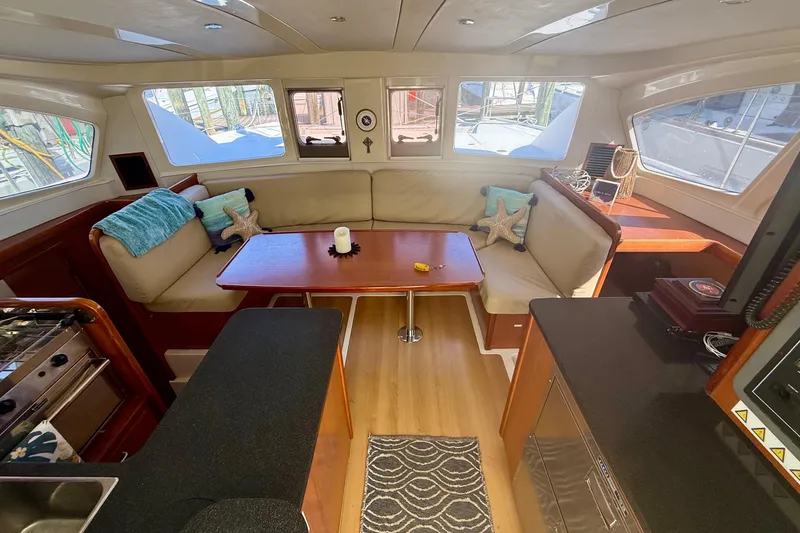  Yacht Photos Pics Interior of 2012 Leopard 39 yacht with cozy seating and modern amenities.