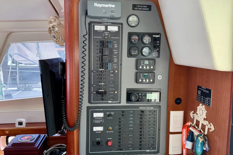  Yacht Photos Pics Electrical control panel on a 2012 Leopard 39 yacht, featuring Raymarine equipment.