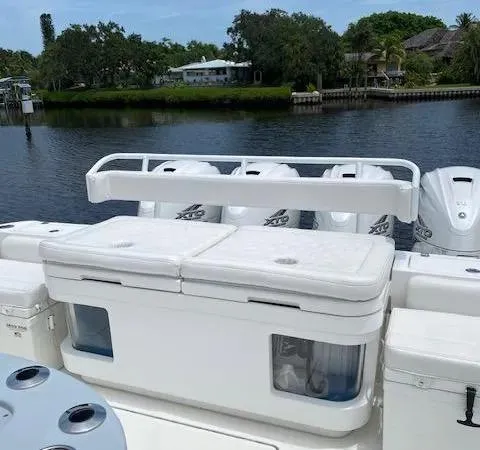  Yacht Photos Pics 2019 HCB 53 Sue&ntilde;os boat with multiple outboard engines on a calm waterway.