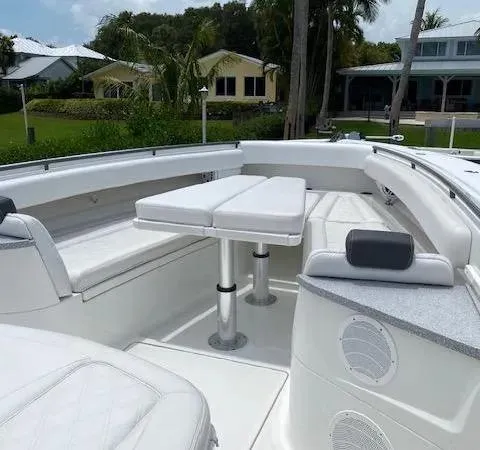  Yacht Photos Pics Luxurious 2019 HCB 53 Sue&ntilde;os boat interior with white seating and table.