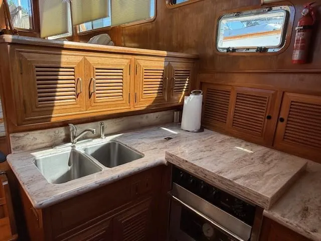 Blue Agave Yacht Photos Pics Galley - double sinks, Corian countertops
