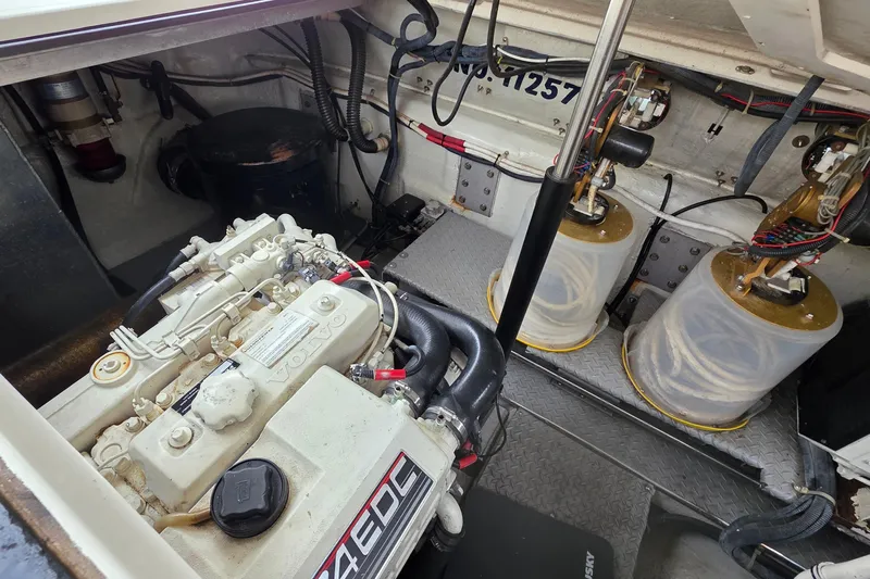  Yacht Photos Pics Engine room of 2002 Regal Commodore 4260 with Volvo Penta engine and mechanical components.